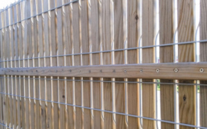 Installation de clôture décorative pour embellir et sécuriser votre extérieur